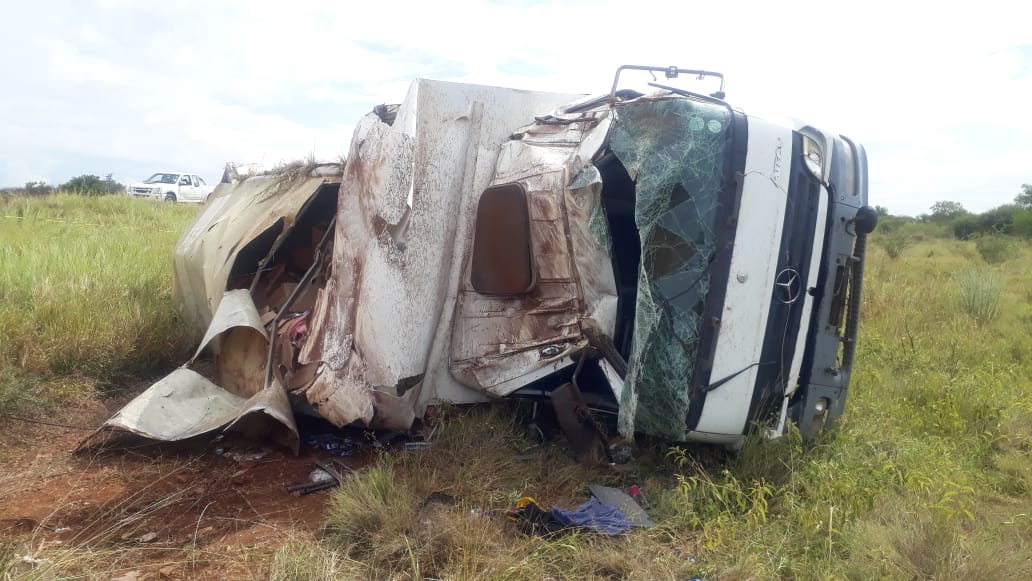 POLICE ATTENDING TO CULPABLE HOMICIDE SCENE DISCOVER OVERTURNED TRUCK LADEN WITH ILLICIT CIGARETTES AND DRIVER TRAPPED INSIDE THE CABIN