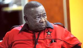 South African Communist Party (SACP) National Chairperson Blade Nzimande has announced his retirement from government and parliament, stating he's no longer interested in continuing. Nzimande, who has been a prominent figure in South African politics, served as Minister of Science, Technology and Innovation and previously held various other ministerial positions, including Higher Education and Transport ¹. His decision to step down comes amid controversy surrounding the National Student Financial Aid Scheme (NSFAS), with some parties calling for his resignation due to alleged corruption and mismanagement. The Inkatha Freedom Party Youth Brigade and the Democratic Alliance have echoed these calls, citing the need for accountability and leadership responsibility ² ³ ⁴. Nzimande's retirement marks a significant shift in the SACP's leadership landscape, with potential implications for the party's direction and alliance with the African National Congress (ANC).